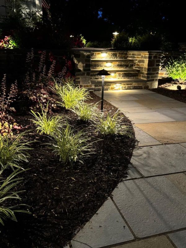 Retaining wall using Techo-Bloc 6” Mini Creta Architectural caps in beautiful chestnut brown, and stone granite boulders - Pool and Patio Retreat - New Projects by Burkholder Landscape