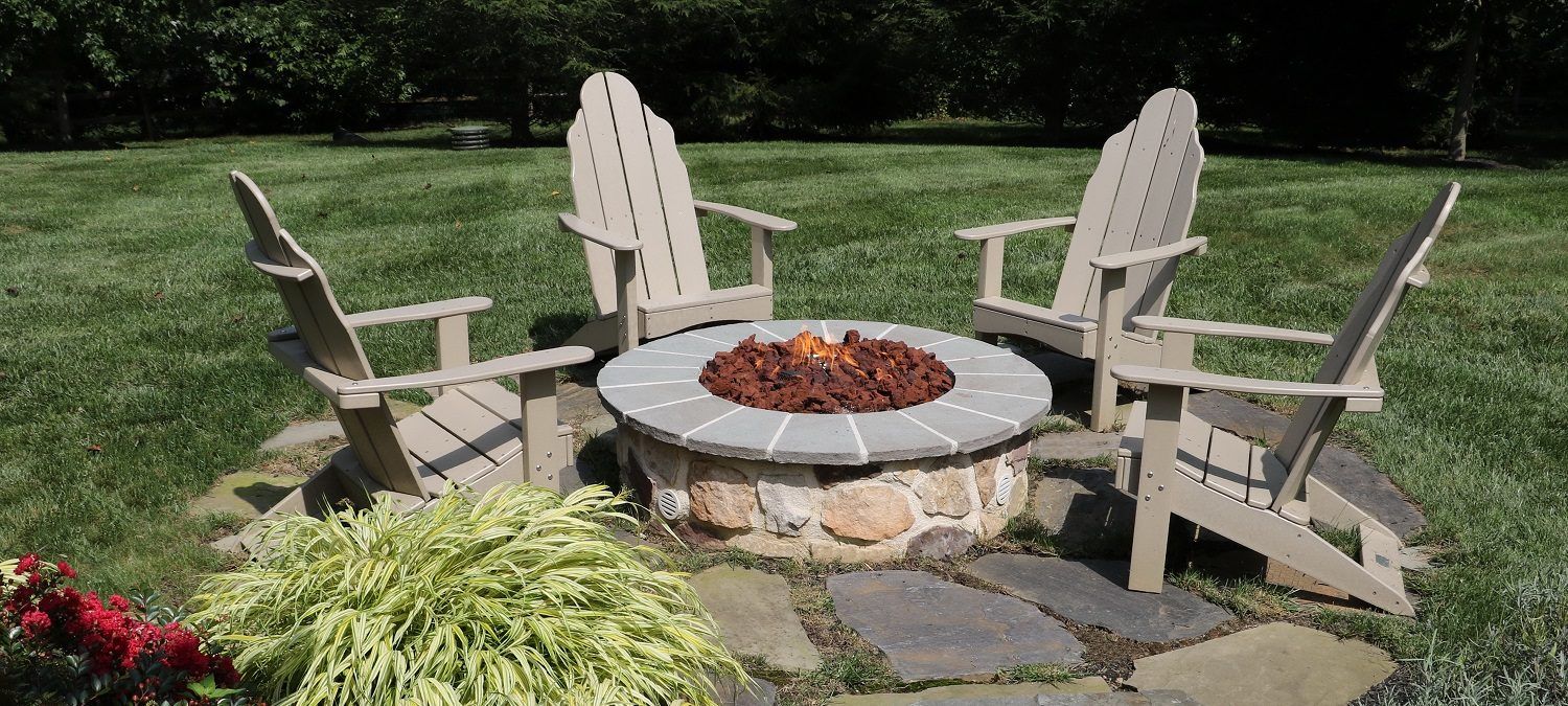 firepit on level landscape - benefits of landscape grading - Burkholder Landscape